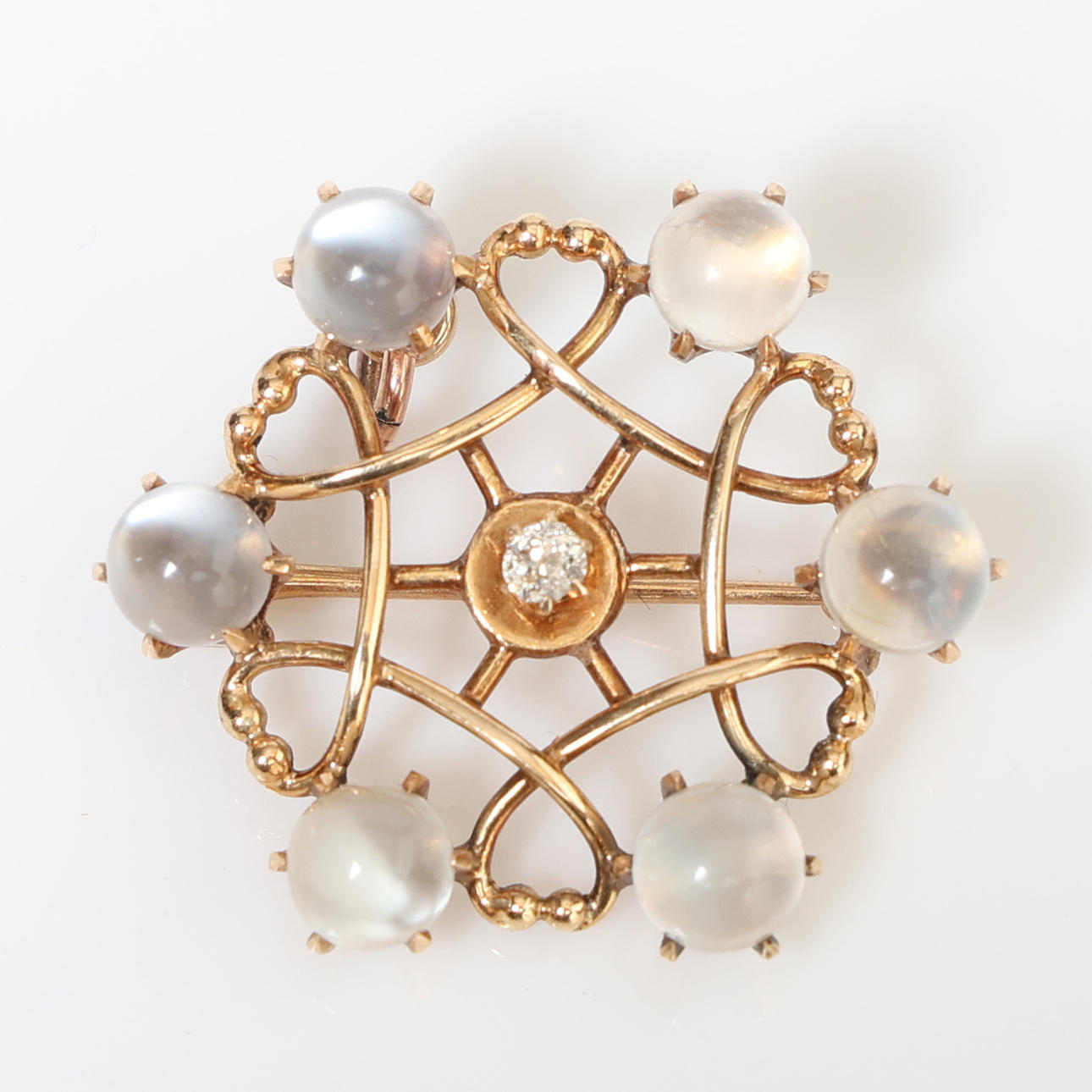 BROCHE/VEDHÆNG, MÅNESTEN OG DIAMANT.