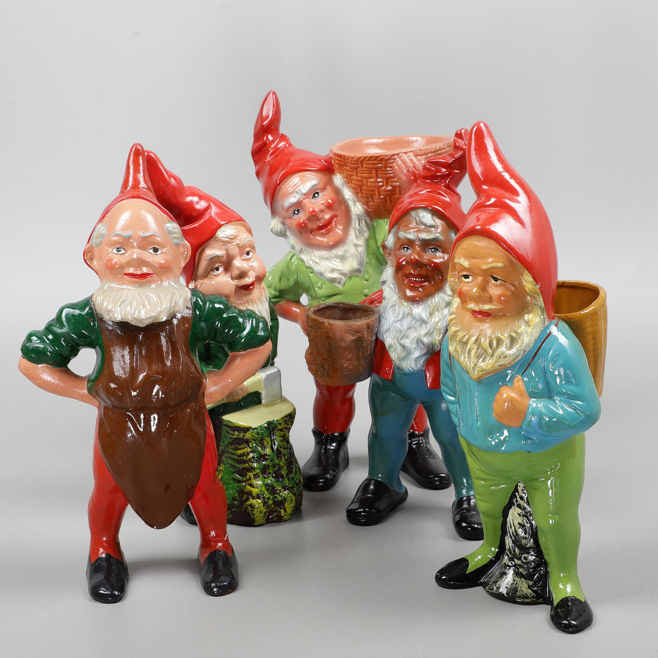 A set of five German earthenware tomtar, 20th century.