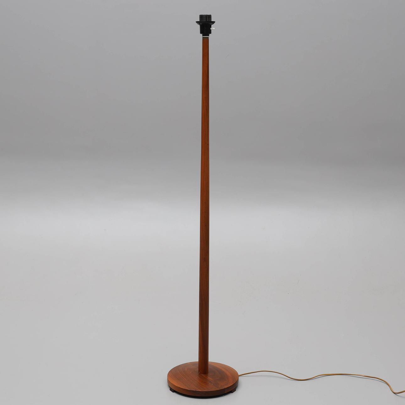 A teak floor lamp, 1950s/60s.