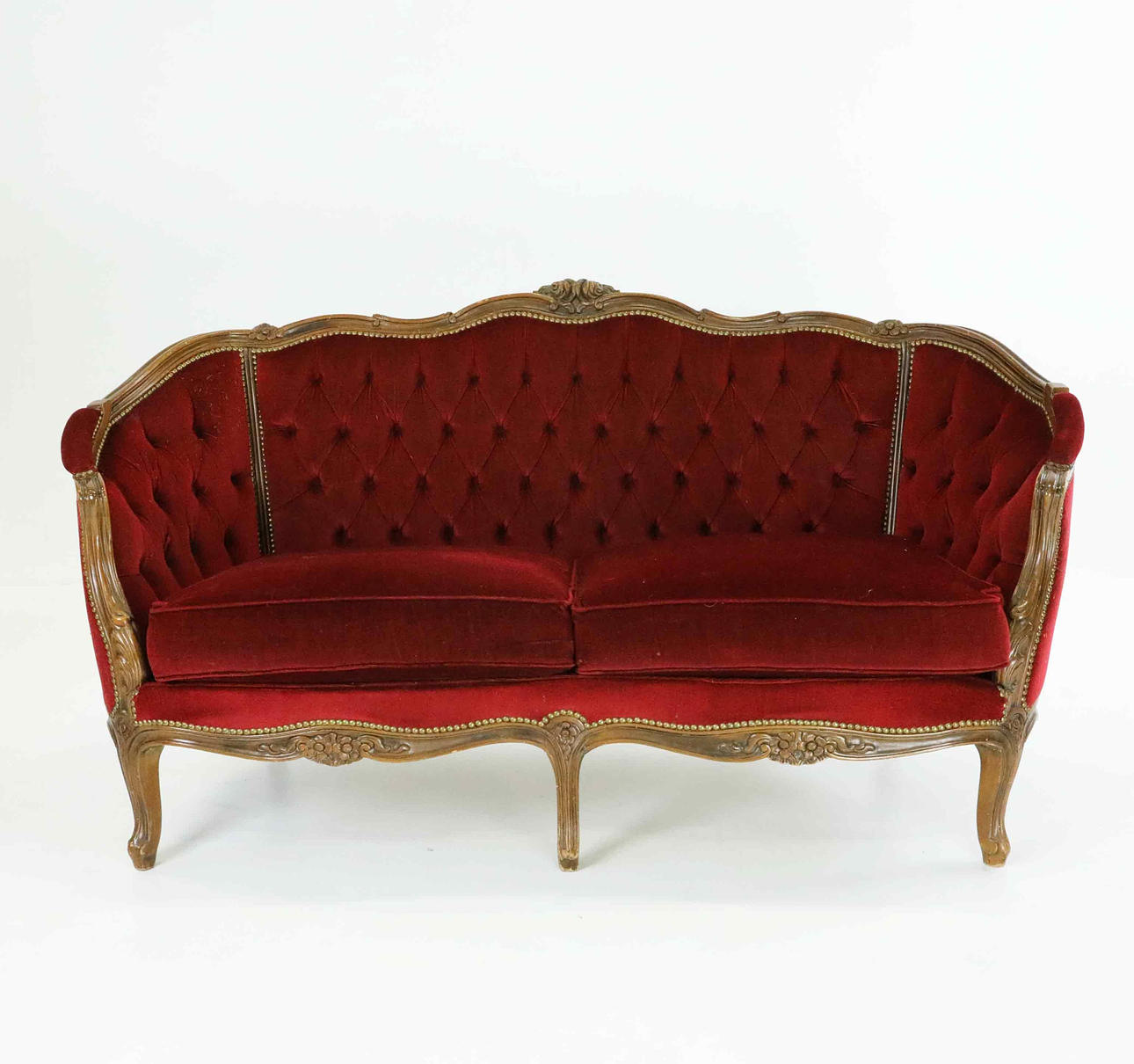 A 20th century Louis XVI style sofa.
