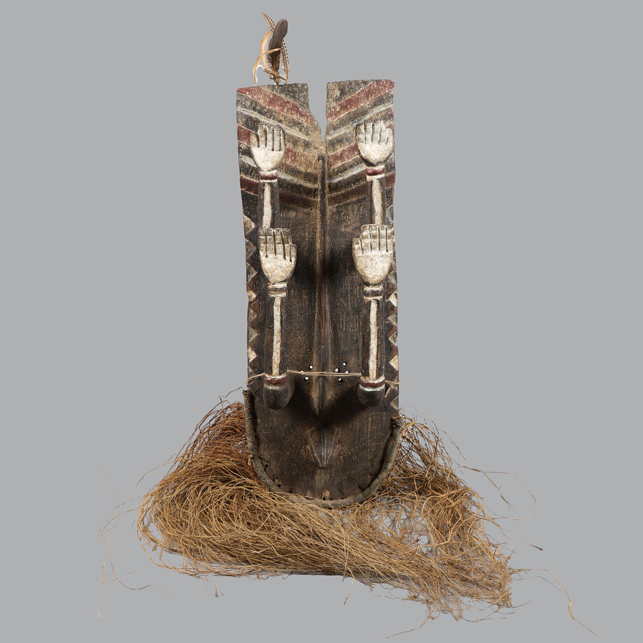 A LARGE GREBO KRU SURRENDER HANDS MASK, LIBERIA.