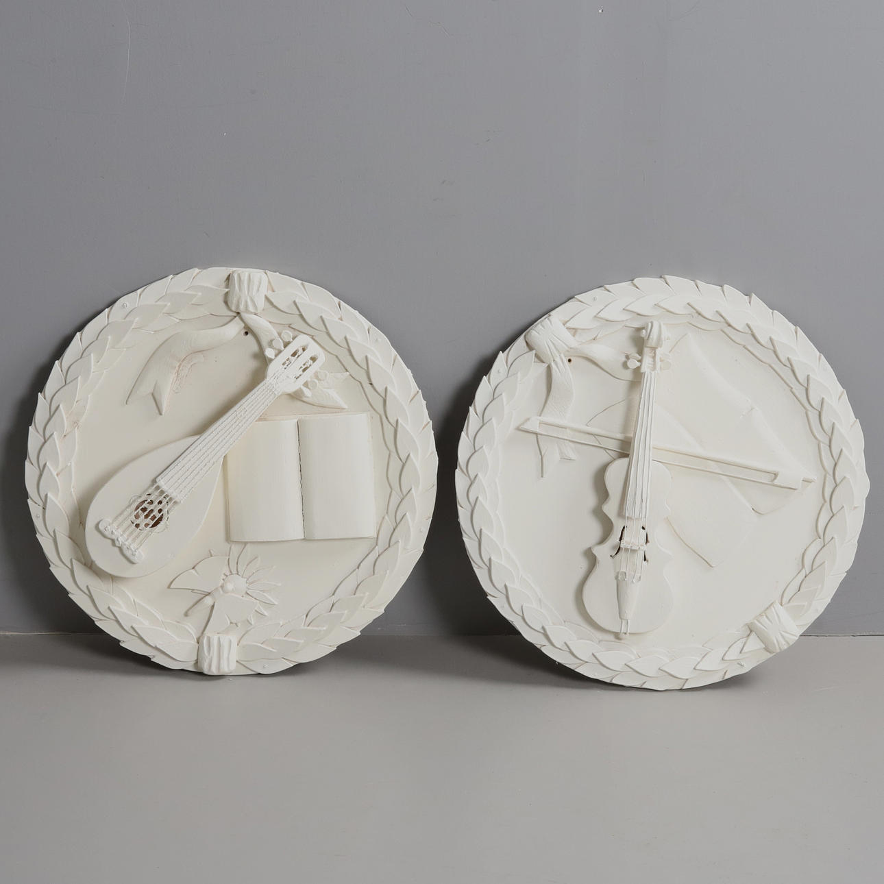 Two 20th century bas-reliefs.