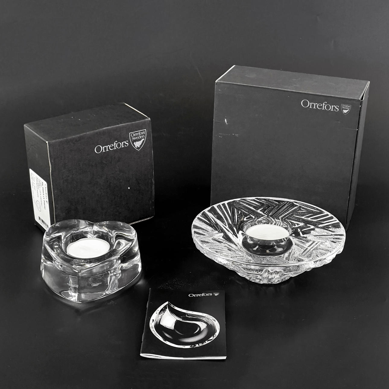 CANDLE LANTERNS, 2 pcs. Martti Rytkönen, Lars Hellsten. Orrefors, in original packaging.