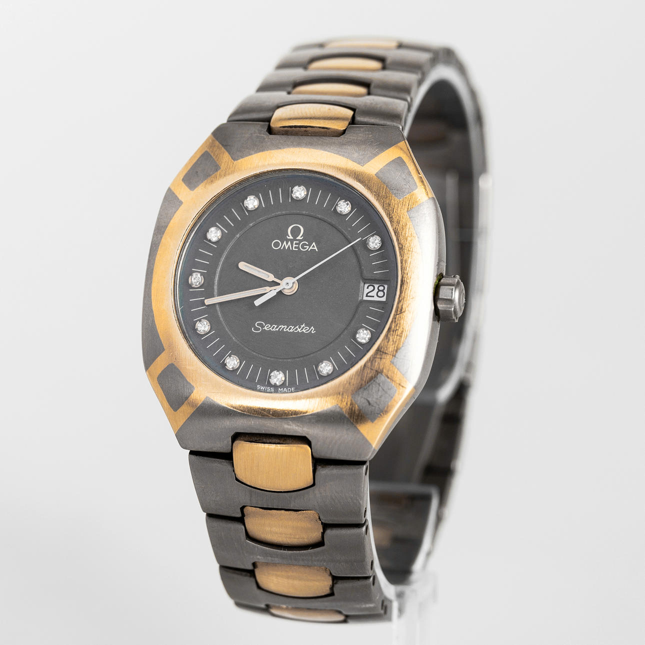 OMEGA SEAMASTER TITANS, titanium/18K GG, diamonds. Clocks 