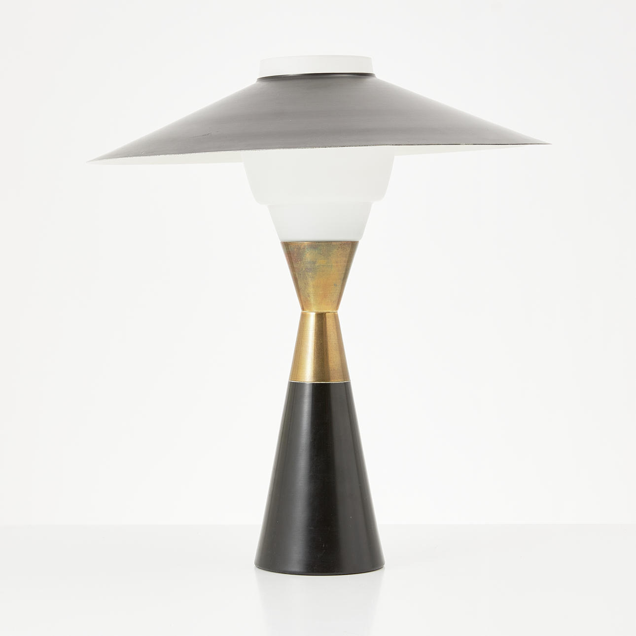 SVEND AAGE HOLM SØRENSEN. Attributed to. Table lamp, ASEA, black lacquered metal with brass details, cup in opaline glass with black lacquered plate shade.