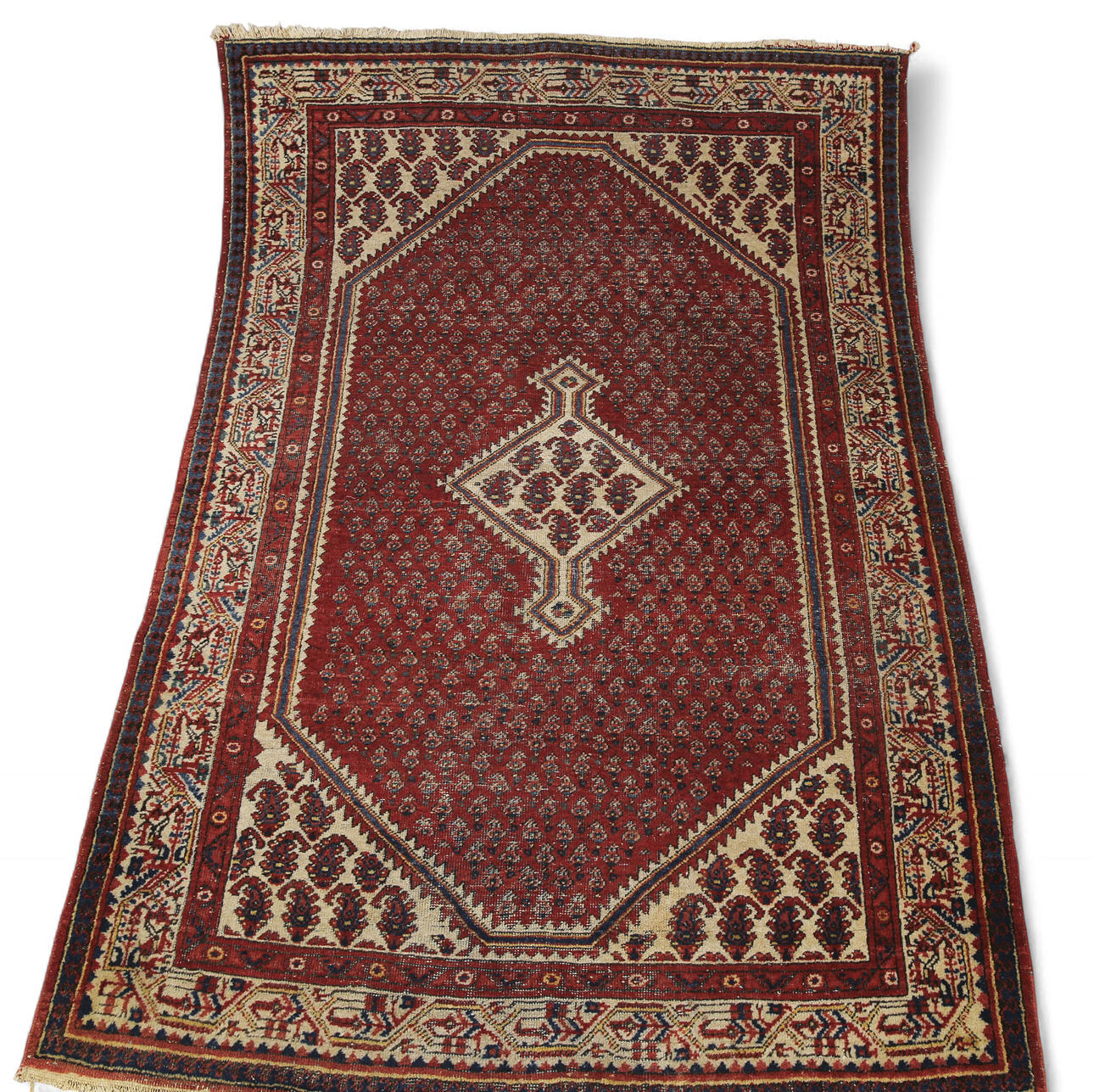 AN ORIENTAL CARPET, hand-knotted, before the 1940s.