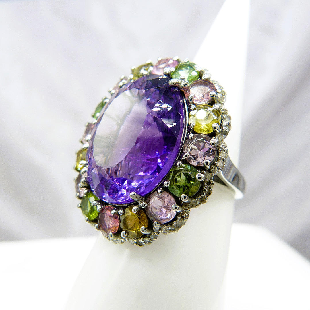 AMETHYST, DIAMOND & TOURMALINE RING.