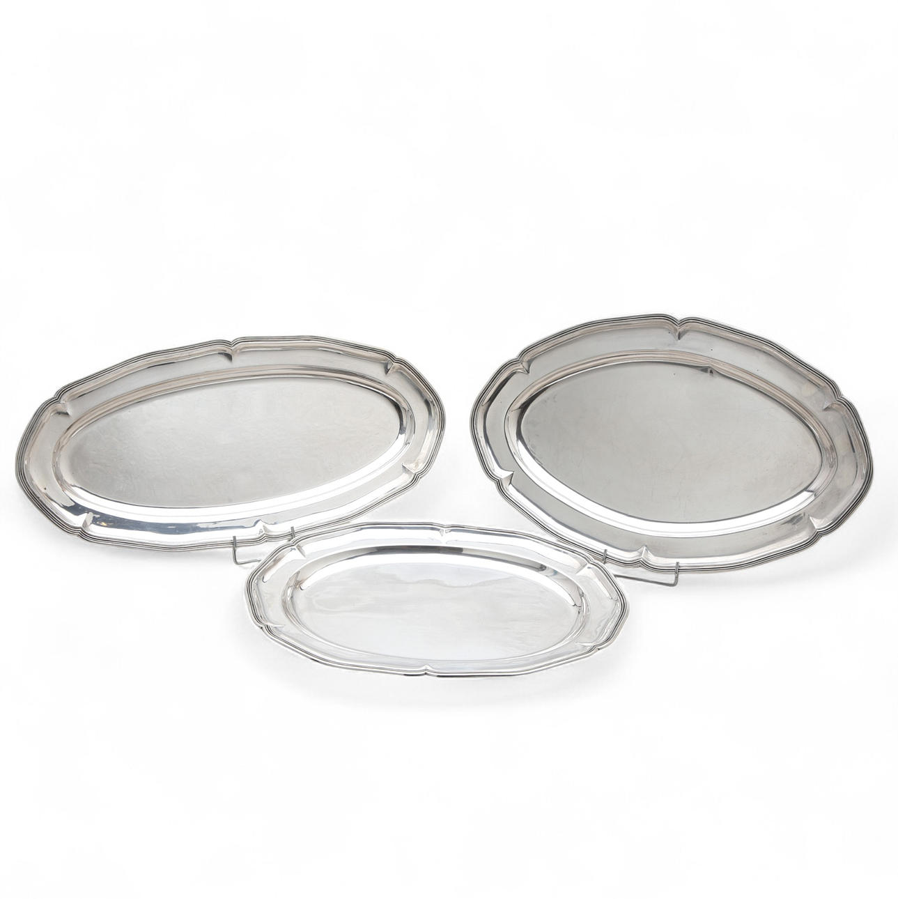 Three silver trays, mid 20th Century.