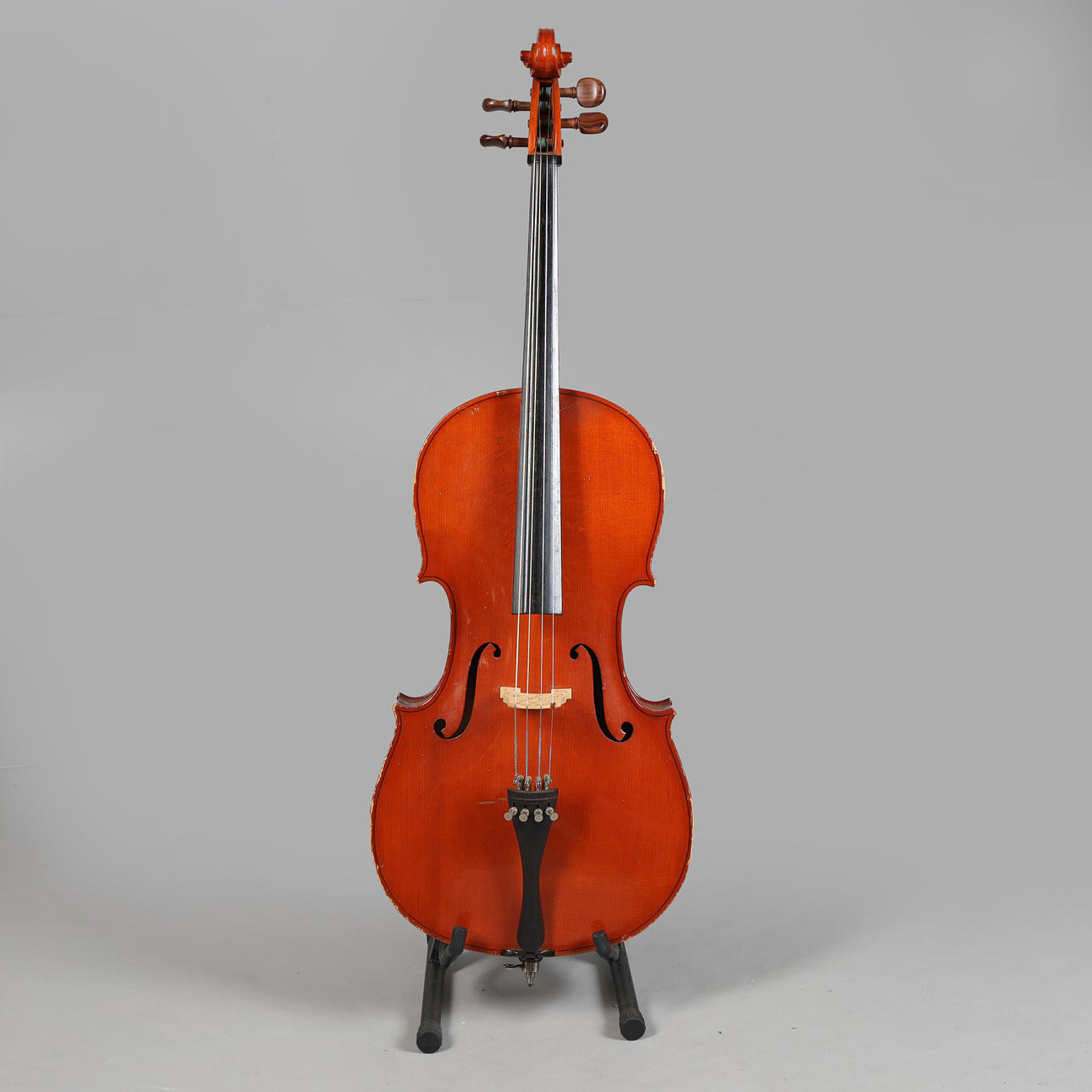 A ROMANIAN 3/4 CELLO AND BOW.