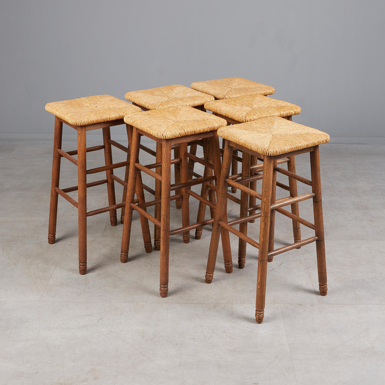 CHARLOTTE PERRIAND. In the style of, Six Barstools/Stools, oak, ruiswork, 1960s, Denmark (6).