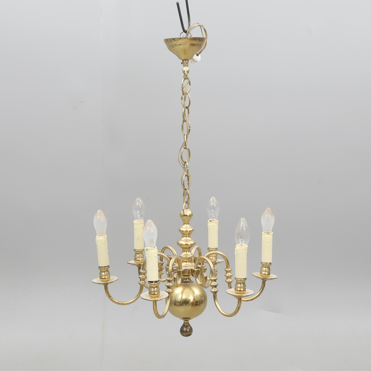 A brass chandelier, mid 20th century.