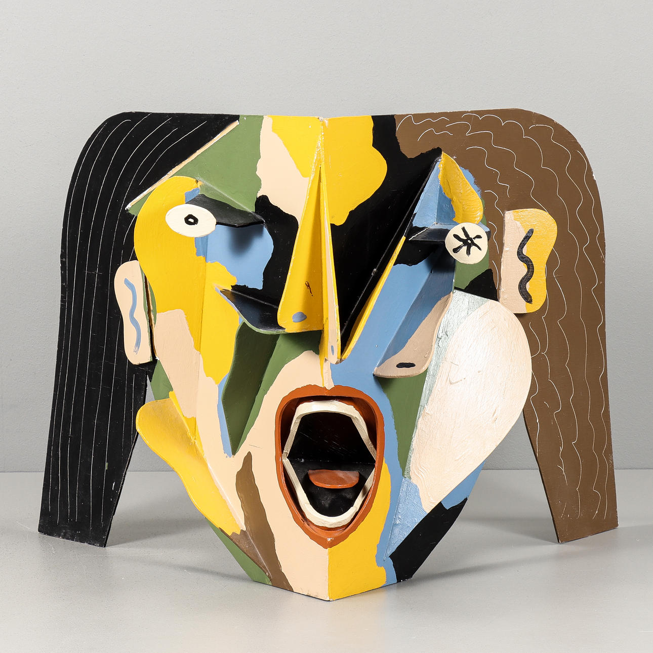 TIMO SOLIN. Sculpture, Face, signed and dated 84.