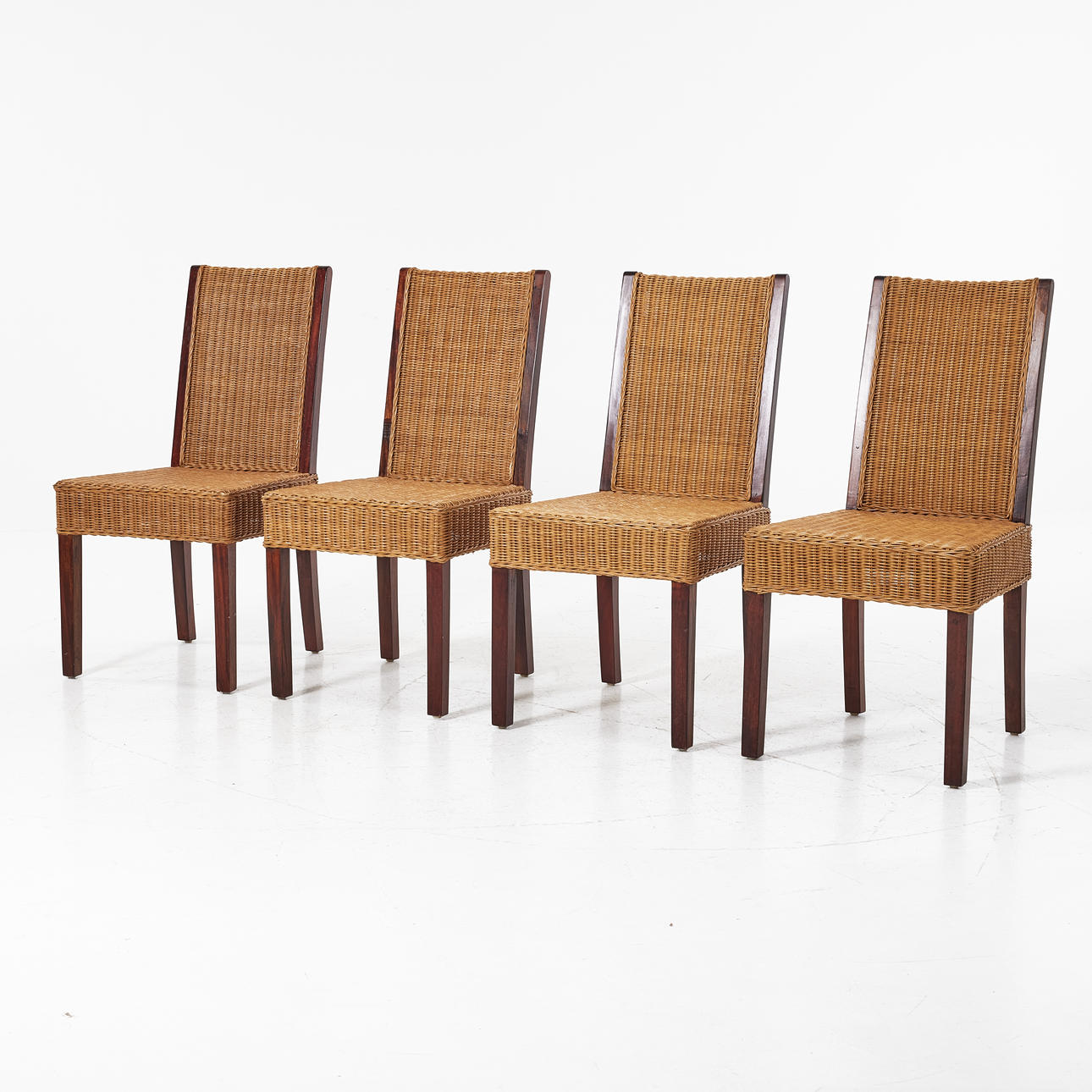 A set of 4 chairs, later half of the 20th century, wicker rattan seats.
