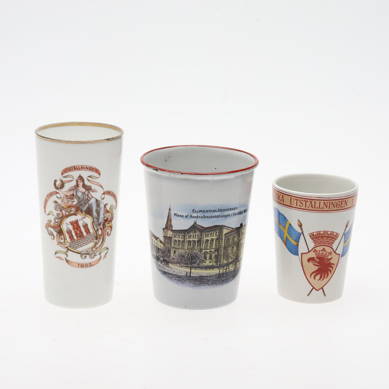 MEMORY MUGS. Three, early 20th century.