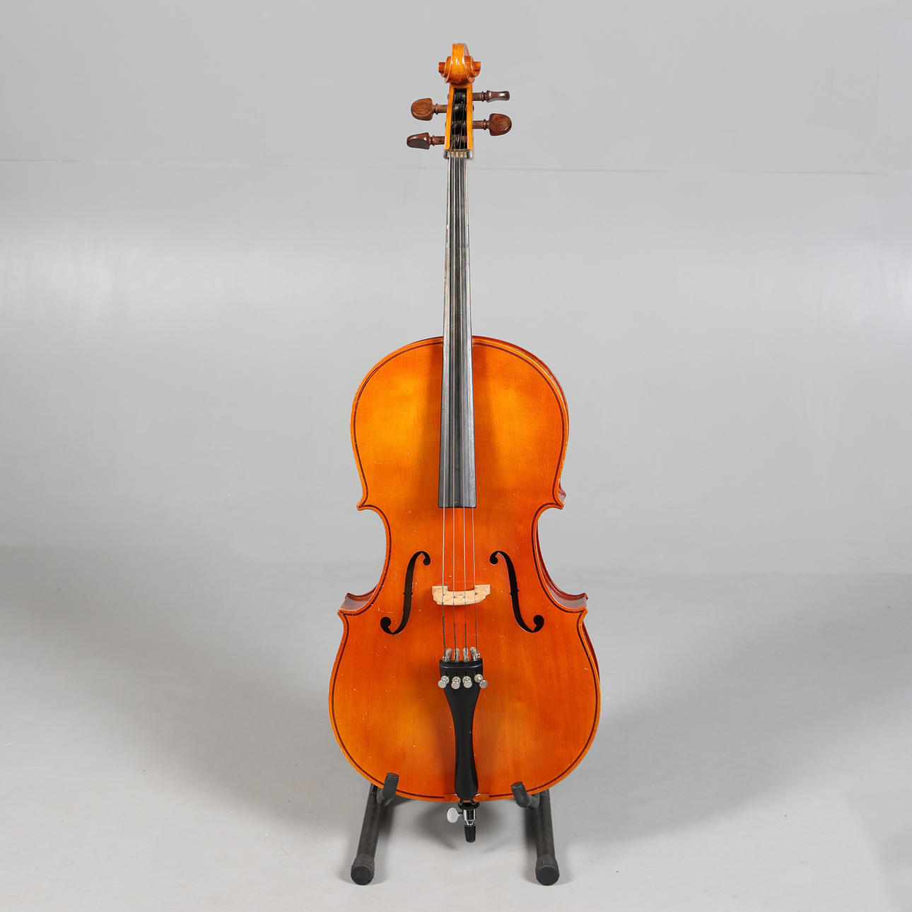 A CASED HUNGARIAN 1/2 CELLO AND BOW.