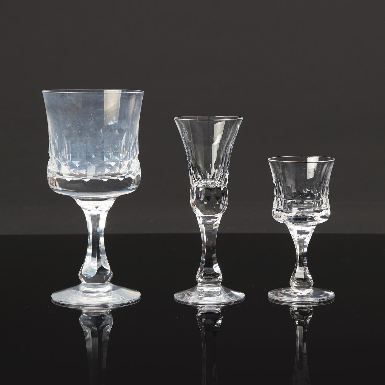 GLASS TABLEWARE, 36 PIECES. Grinded decor. It's unsigned.