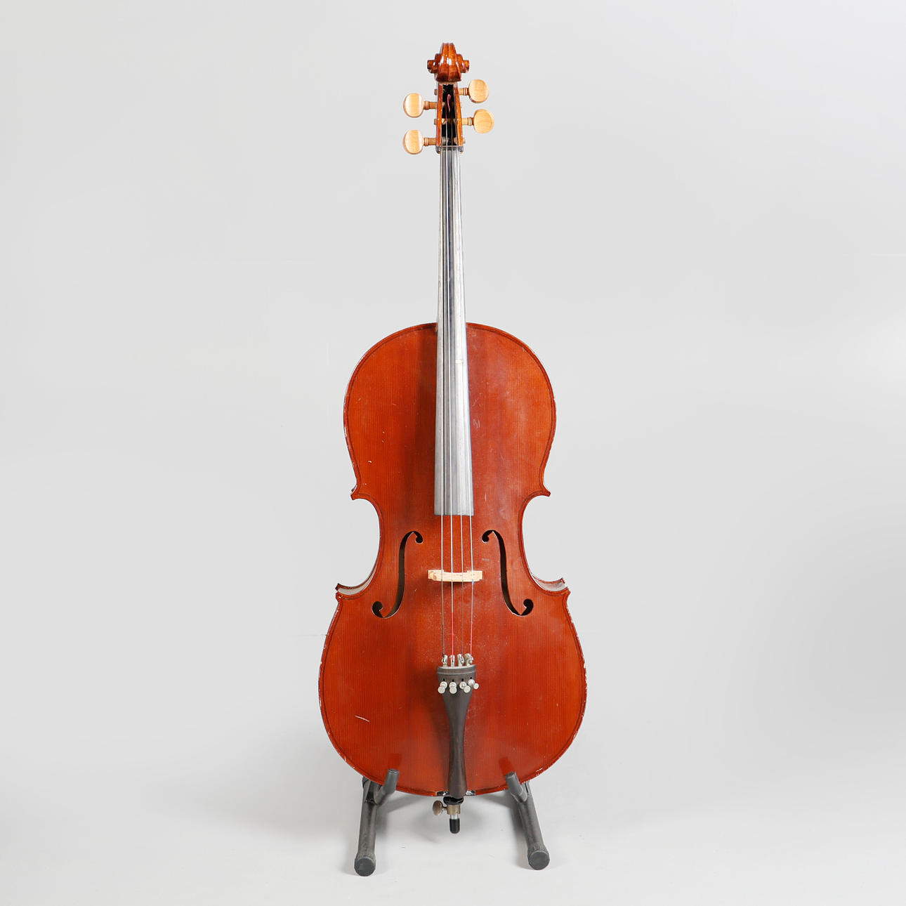 A CASED 3/4 CELLO AND BOW.