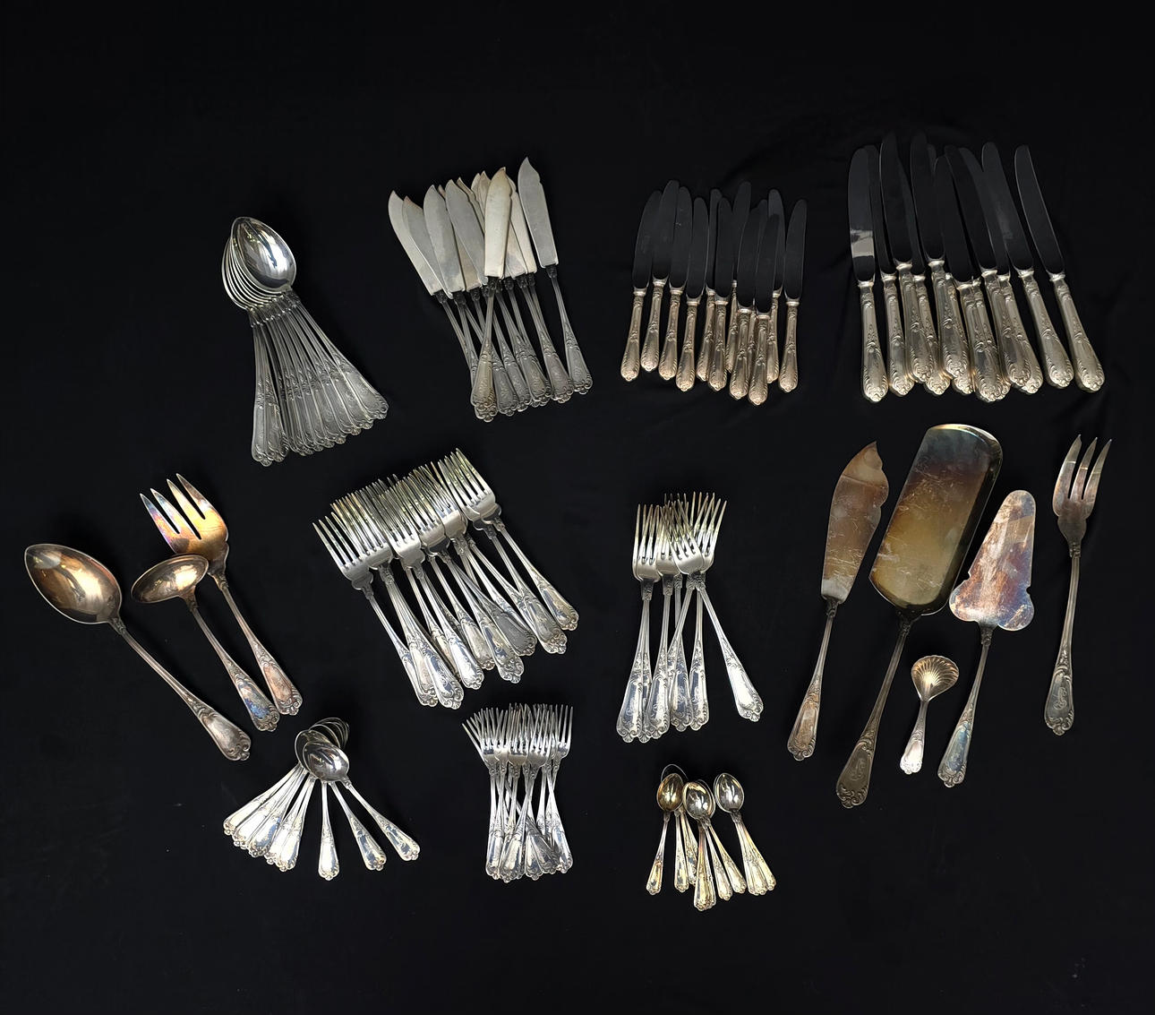 SILVER CUTLERY WITH ENGRAVED INITIALS.