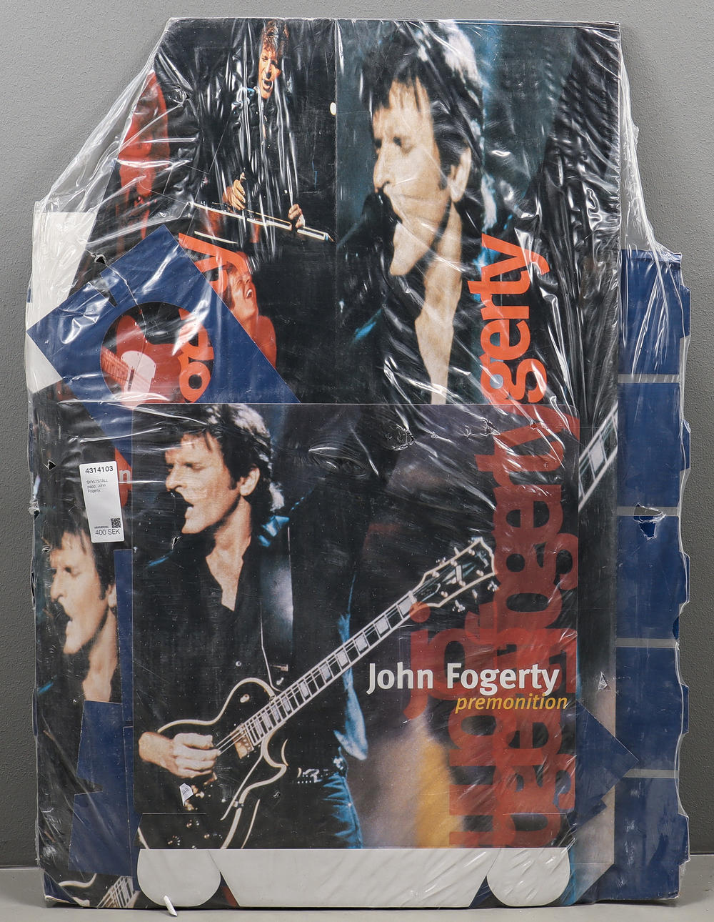 EXPOSITOR DE CARTÓN, John Fogerty.