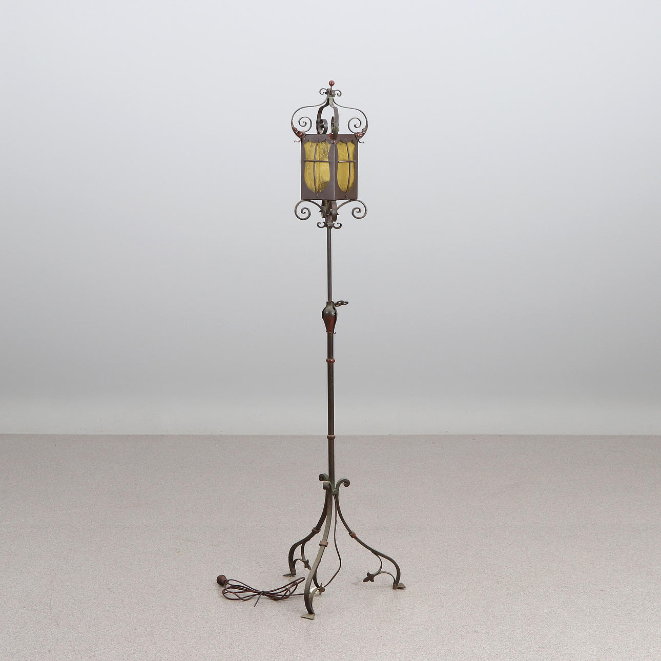 FLOOR LAMP. Forging and glass. 20th century. In the form of a lantern.