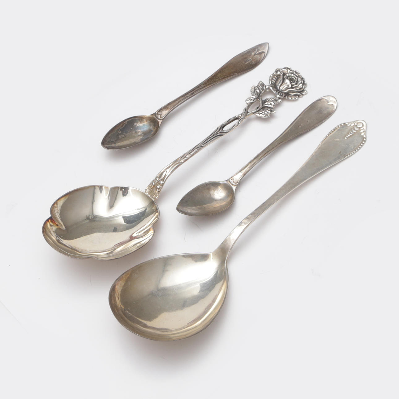 Besteck, 4-teilig, Silber.