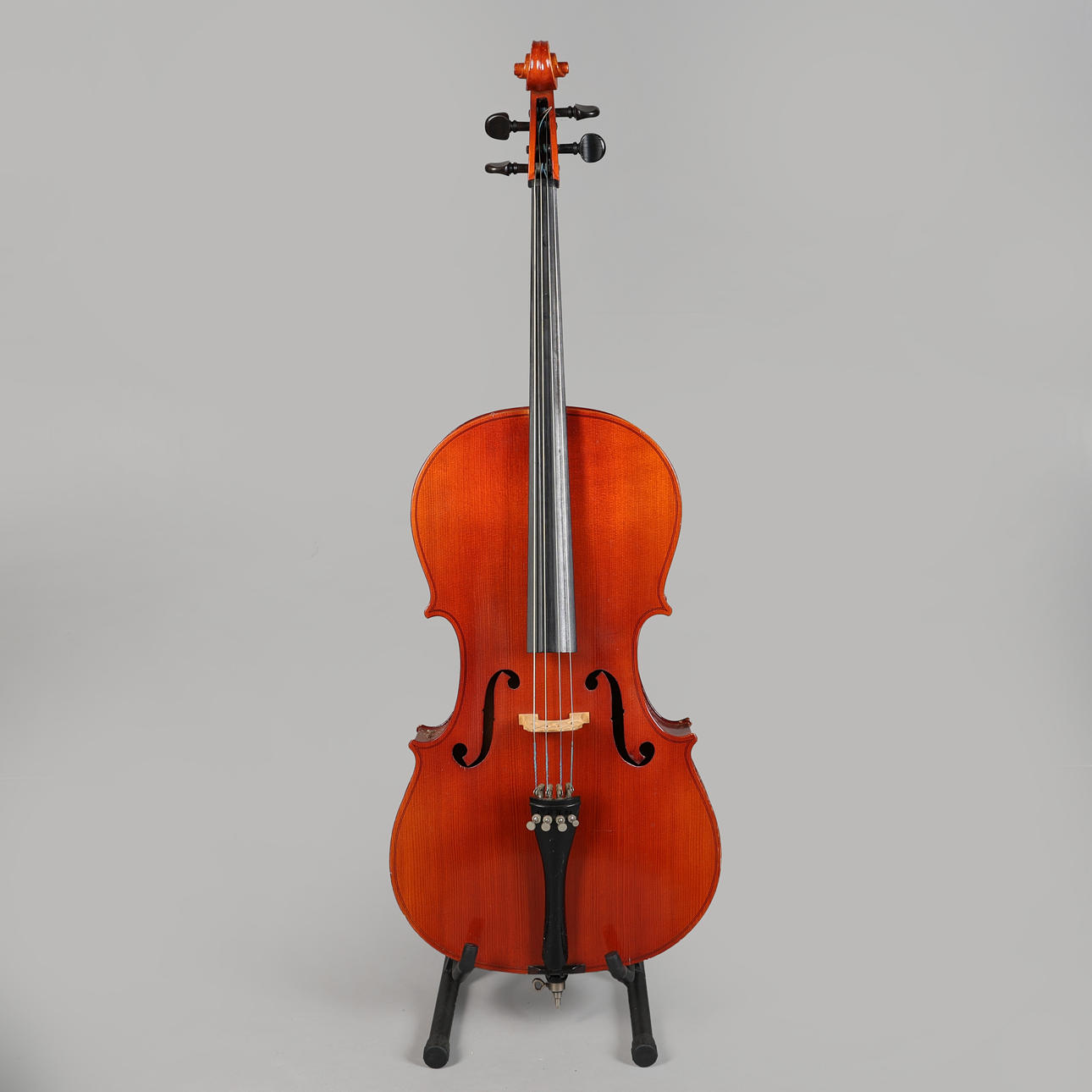 A CASED 3/4 CELLO WITH BOW.