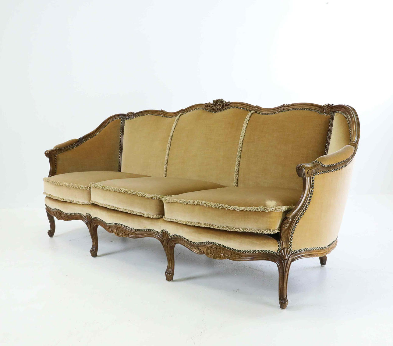 A 20th century Louis XVI style sofa.