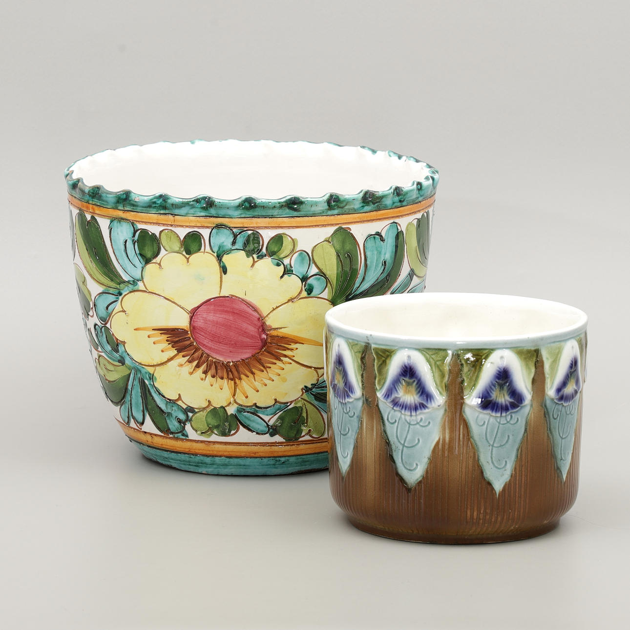 Two ceramic and porcelain outer liners, 20th century.