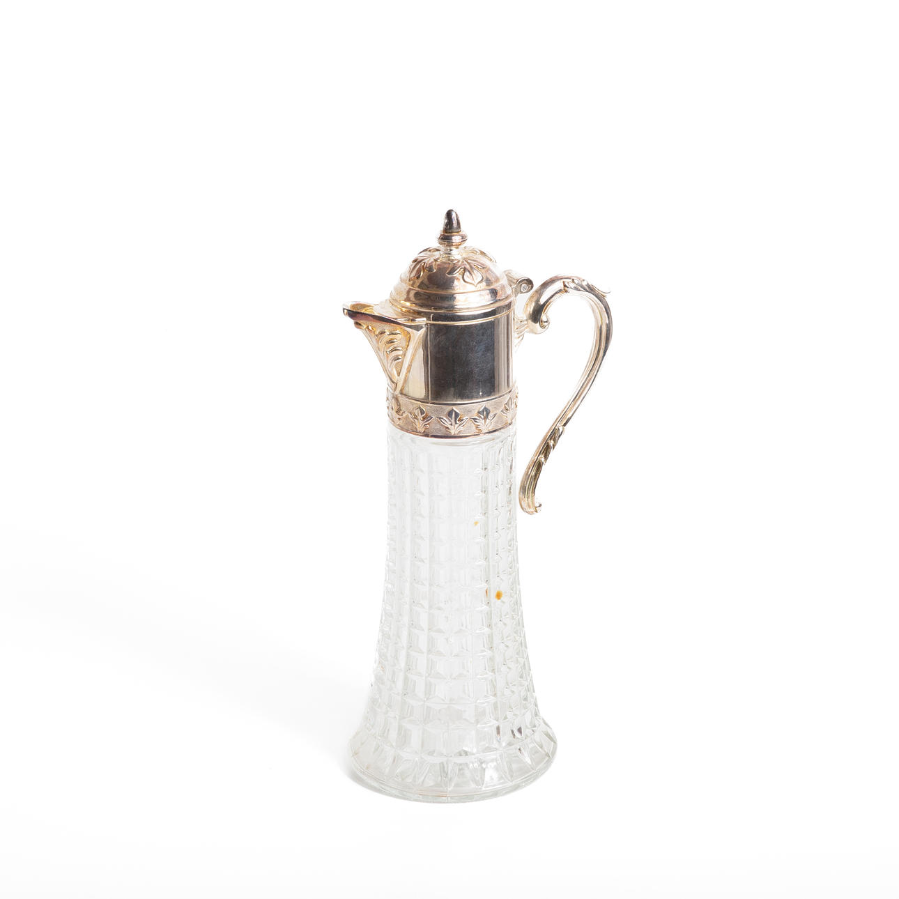 A silver plated metal jug, glass, 1900's.