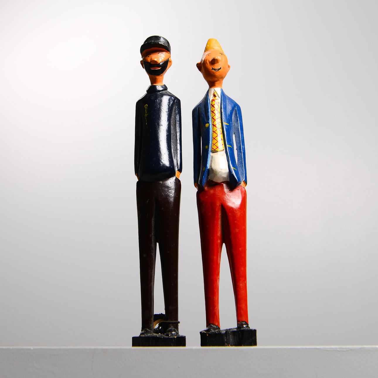 TINTIN & CAPTAIN HADDOCK, painted wood figurines.