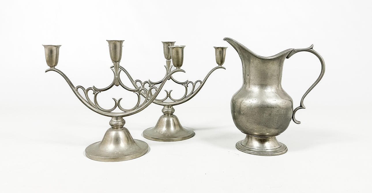 A pewter candlesticks & jug, 20th century.