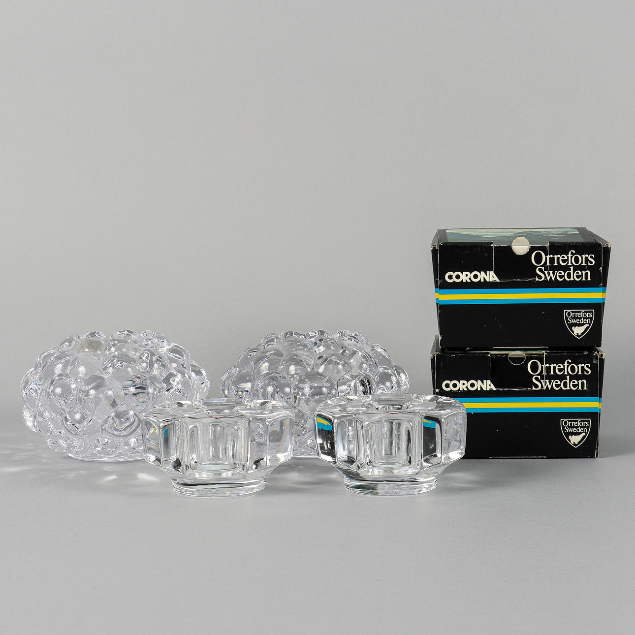 CANDLESTICKS 4 pieces, glass, Orrefors.