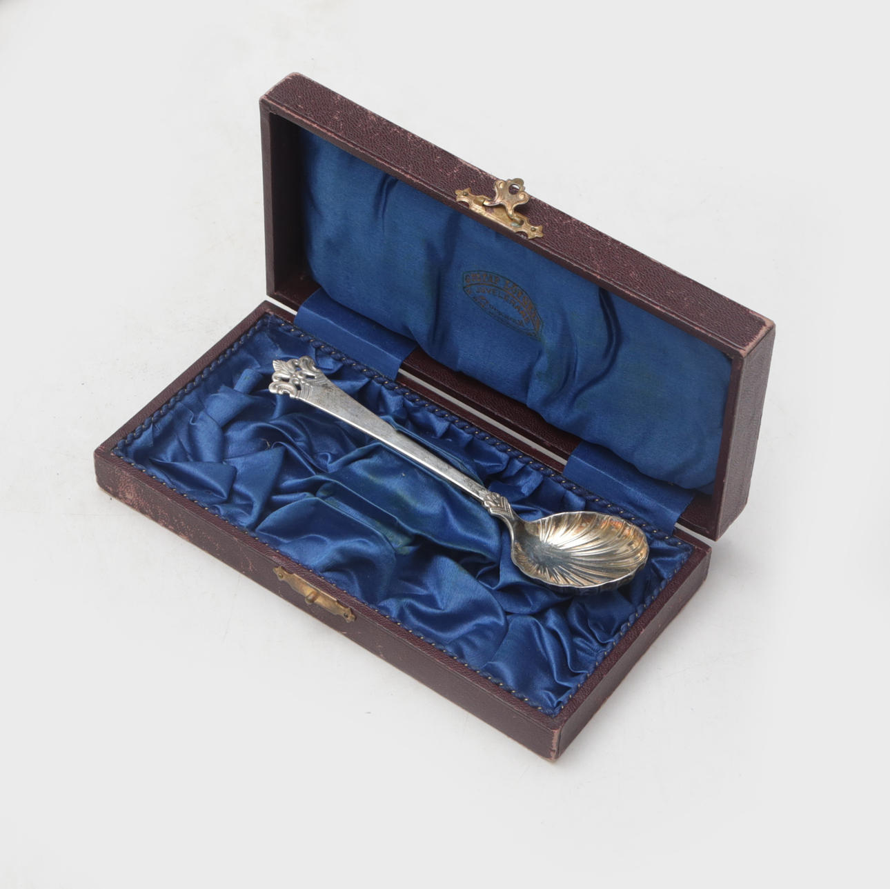 Spoon, silver, in case.