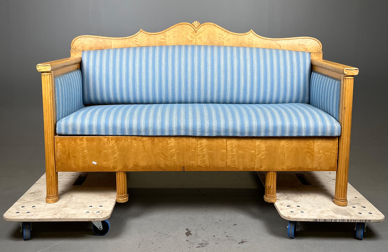 A pull-out sofa, circa 1900.