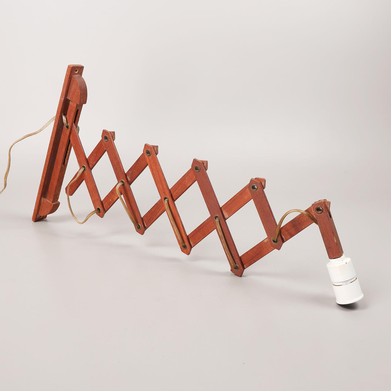 WALL LAMP, teak, scissors model, 1960s.