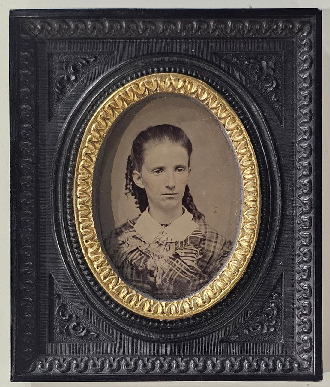Ferrotype in bakelite frame. Circa 1900.