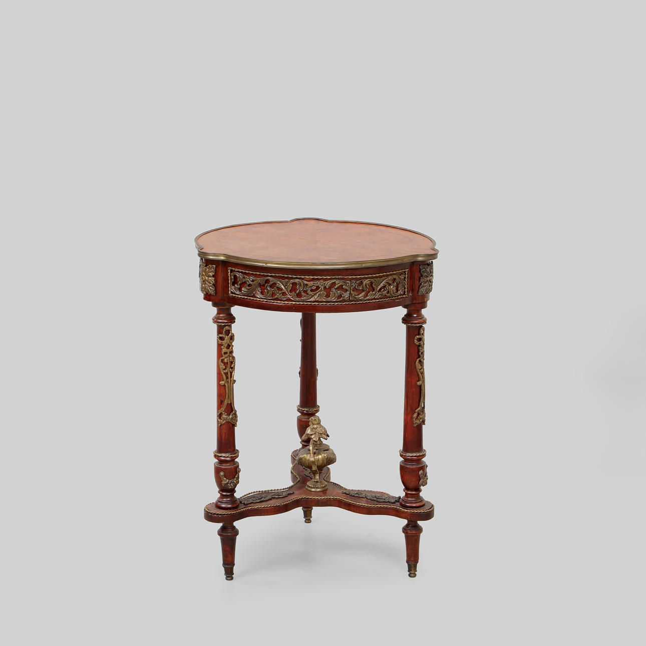 A 20th century Louis XVI style table.