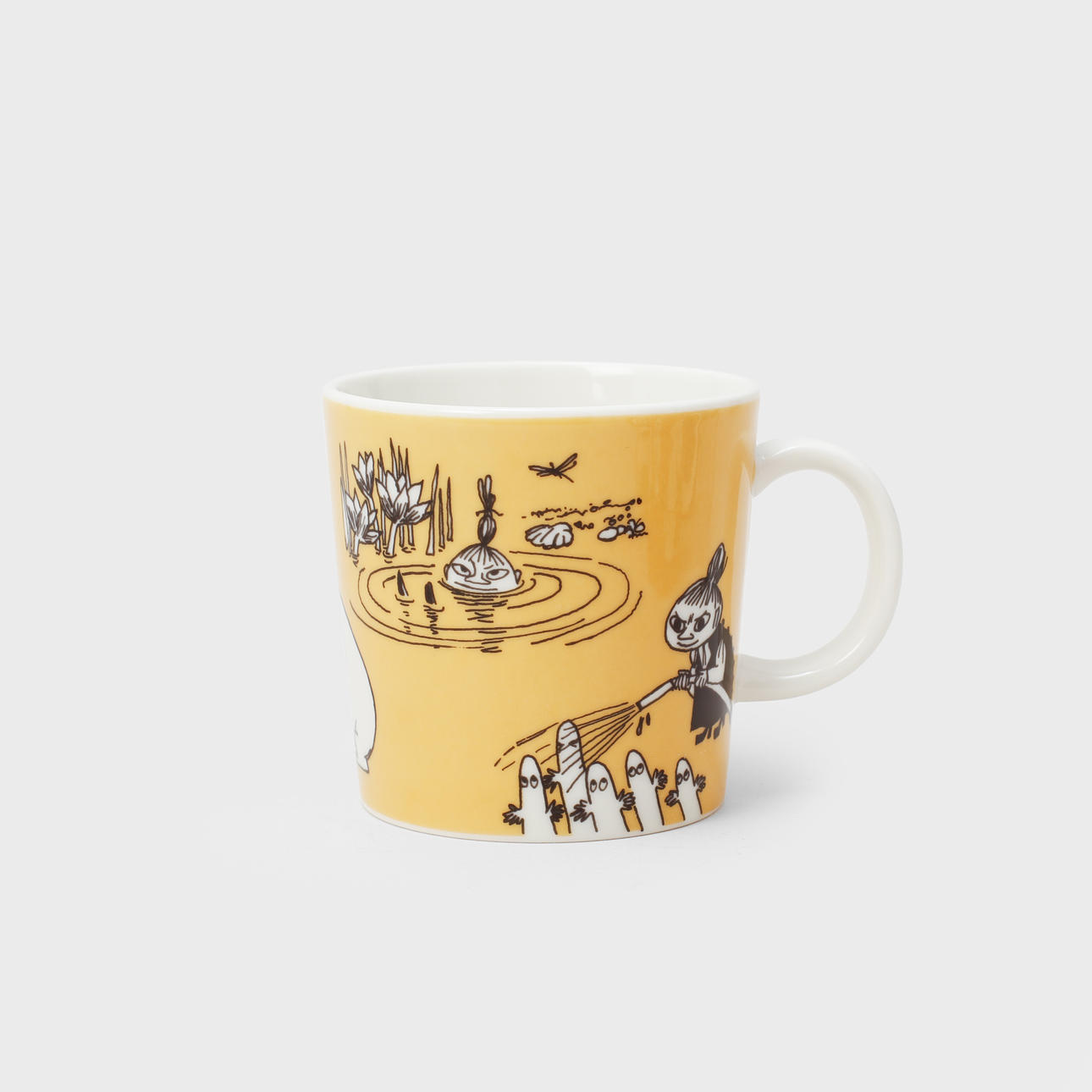 A MOOMIN MUG, “Dark yellow, Little My”, porcelain, Arabia, Finland 