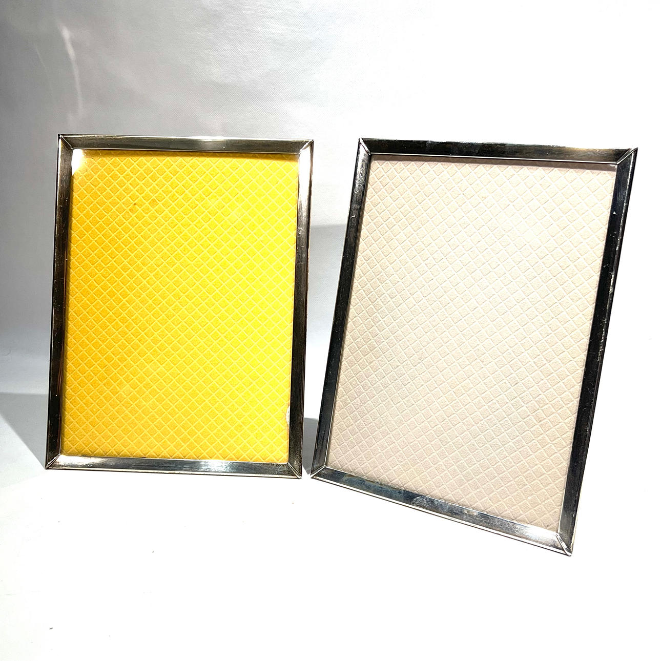 Pair of medium silver frames.