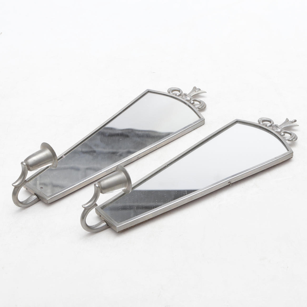 2 pewter wall candlesticks, with mirrors, approx 1930.
