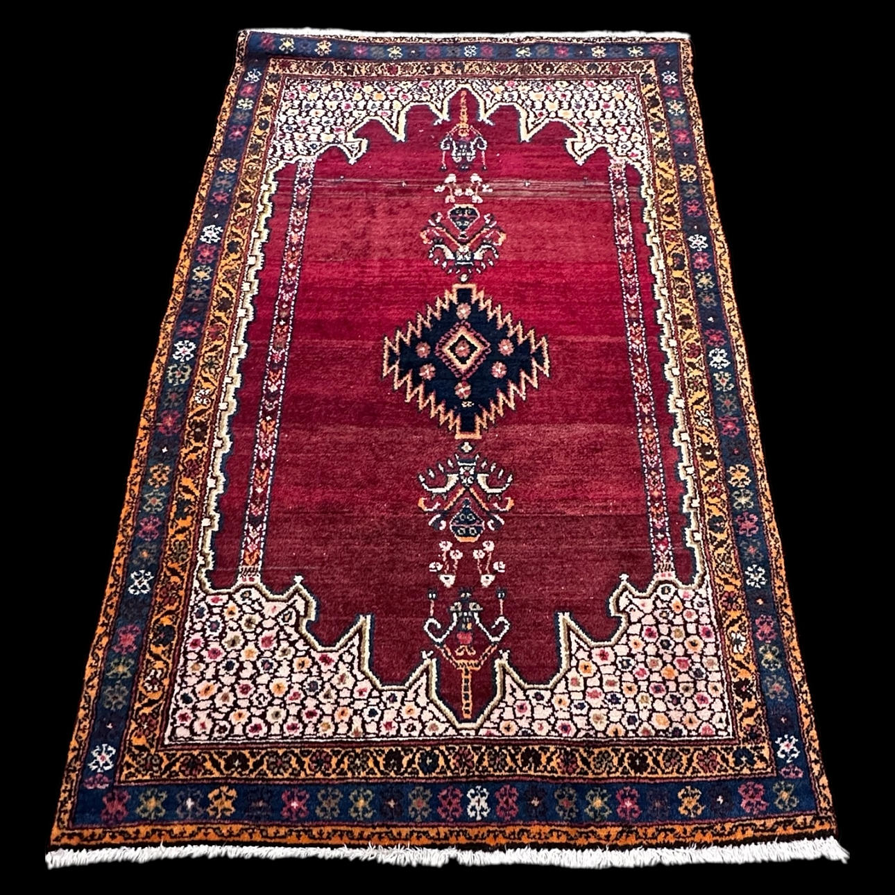 A CARPET, hand-knotted, 180x125.
