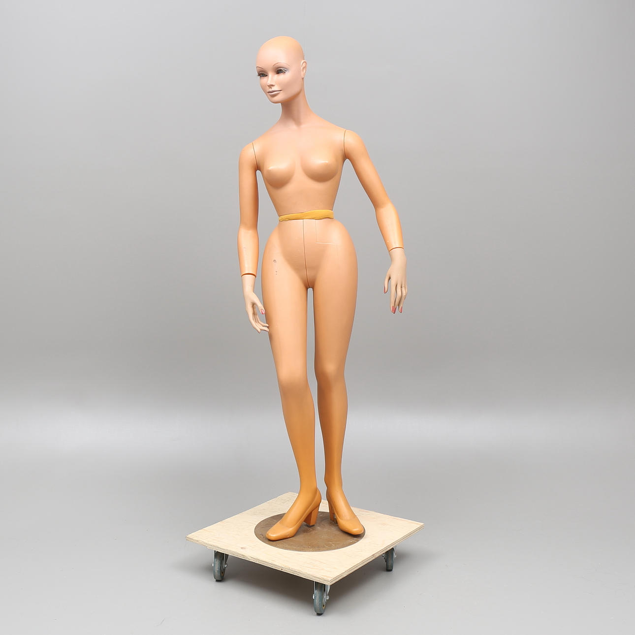 SKYLTDOCKA, 1900-talets mitt.