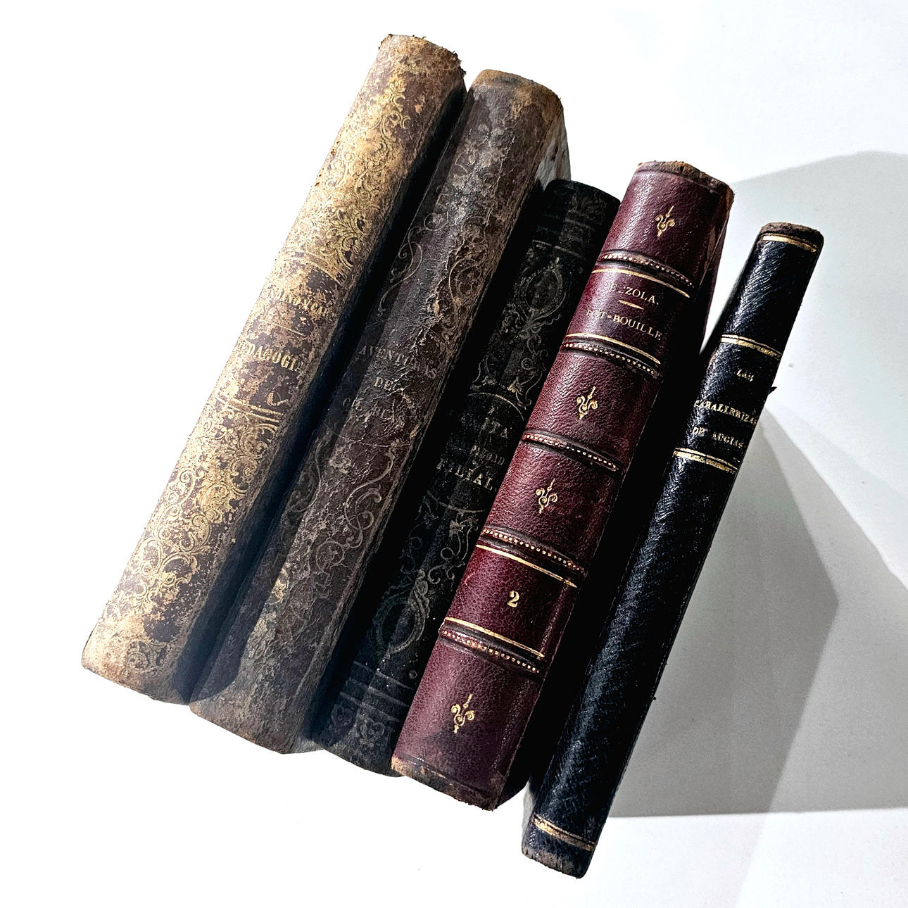 Five old books.