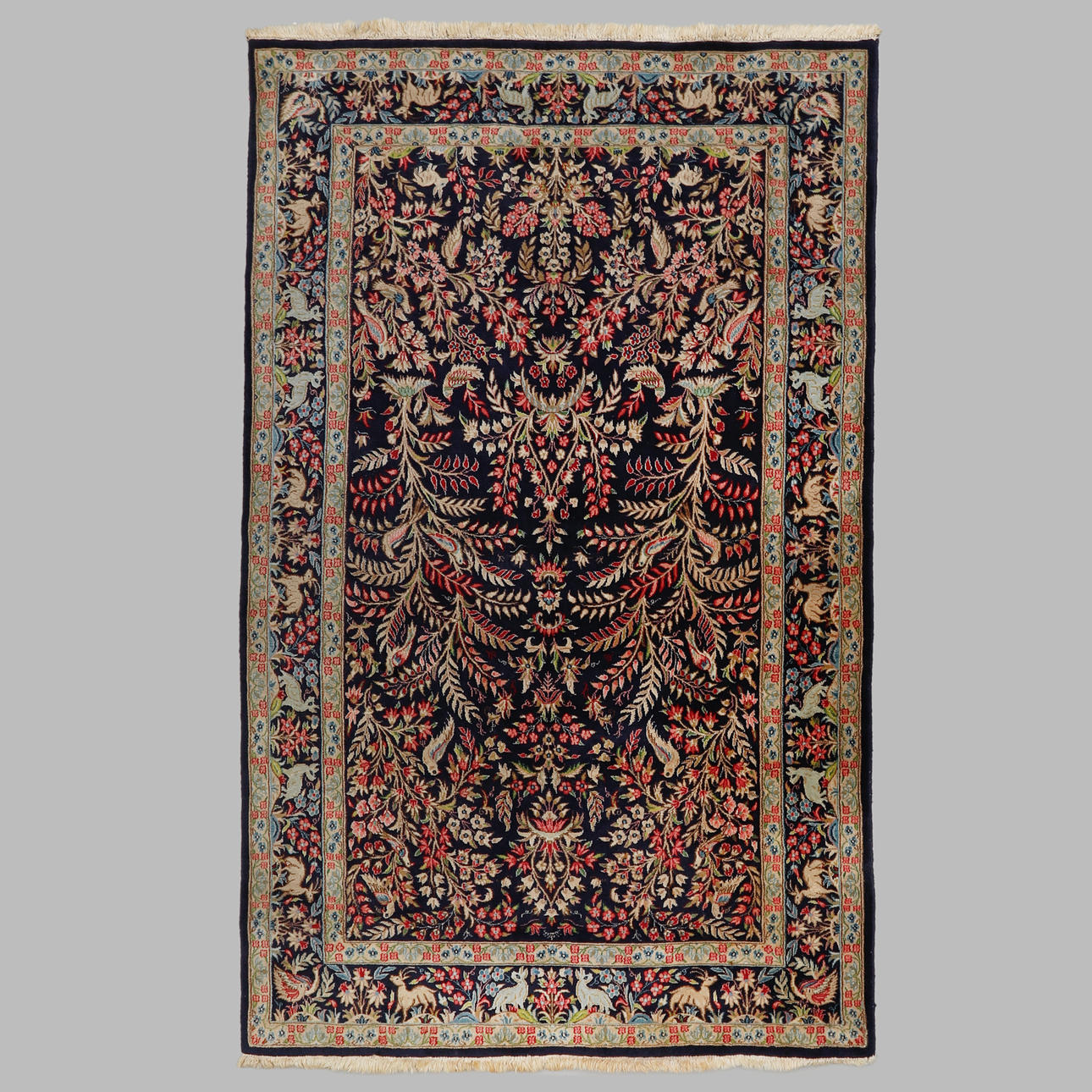 A CARPET, Kirman, 241 x 150 cm.