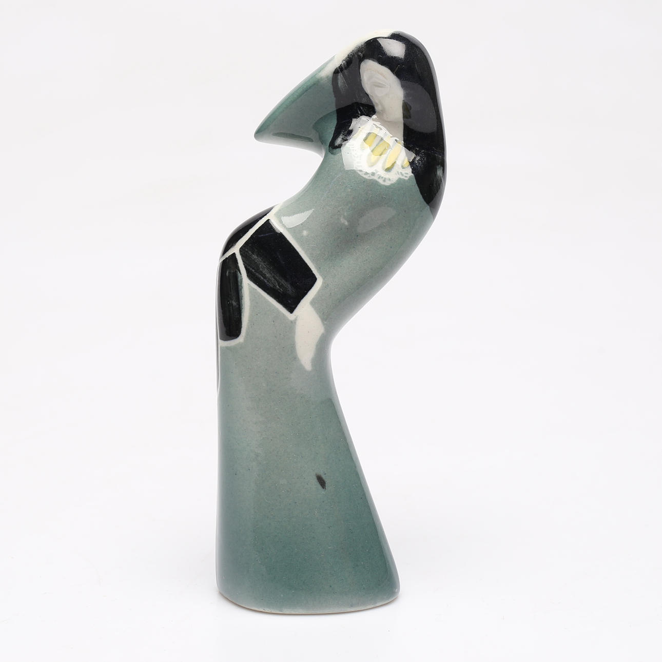 A Hassan Heshmat ceramic figurine.