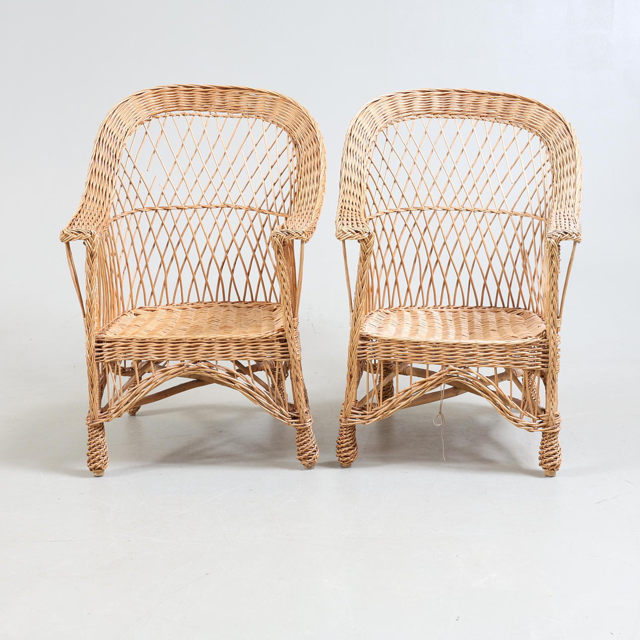 Kurvestole, et par, 1900-tallet.