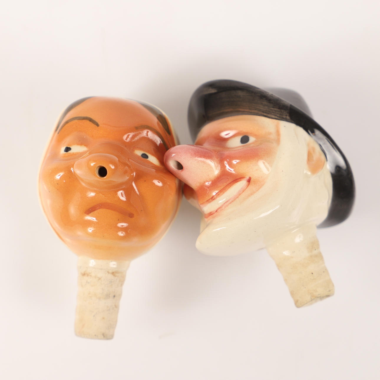 FLASKPROPPAR, 2 stycken, porslin, 1900-tal.