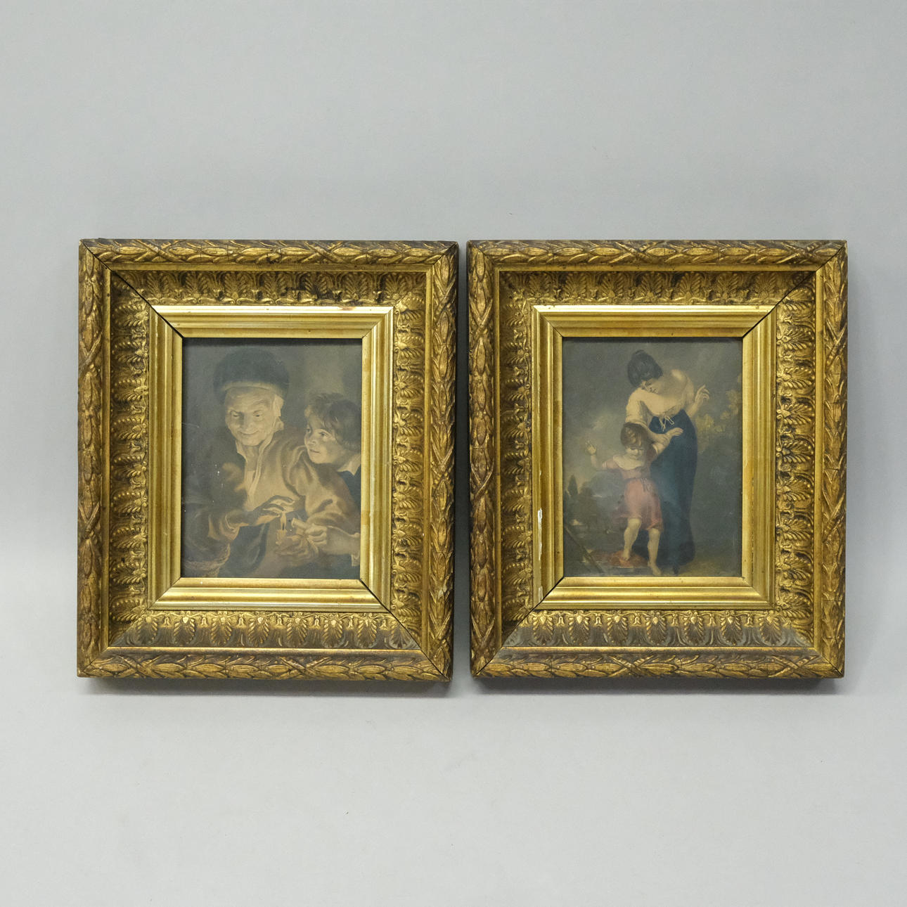 TVÅ TRYCK I FÖRGYLLDA RAMAR.