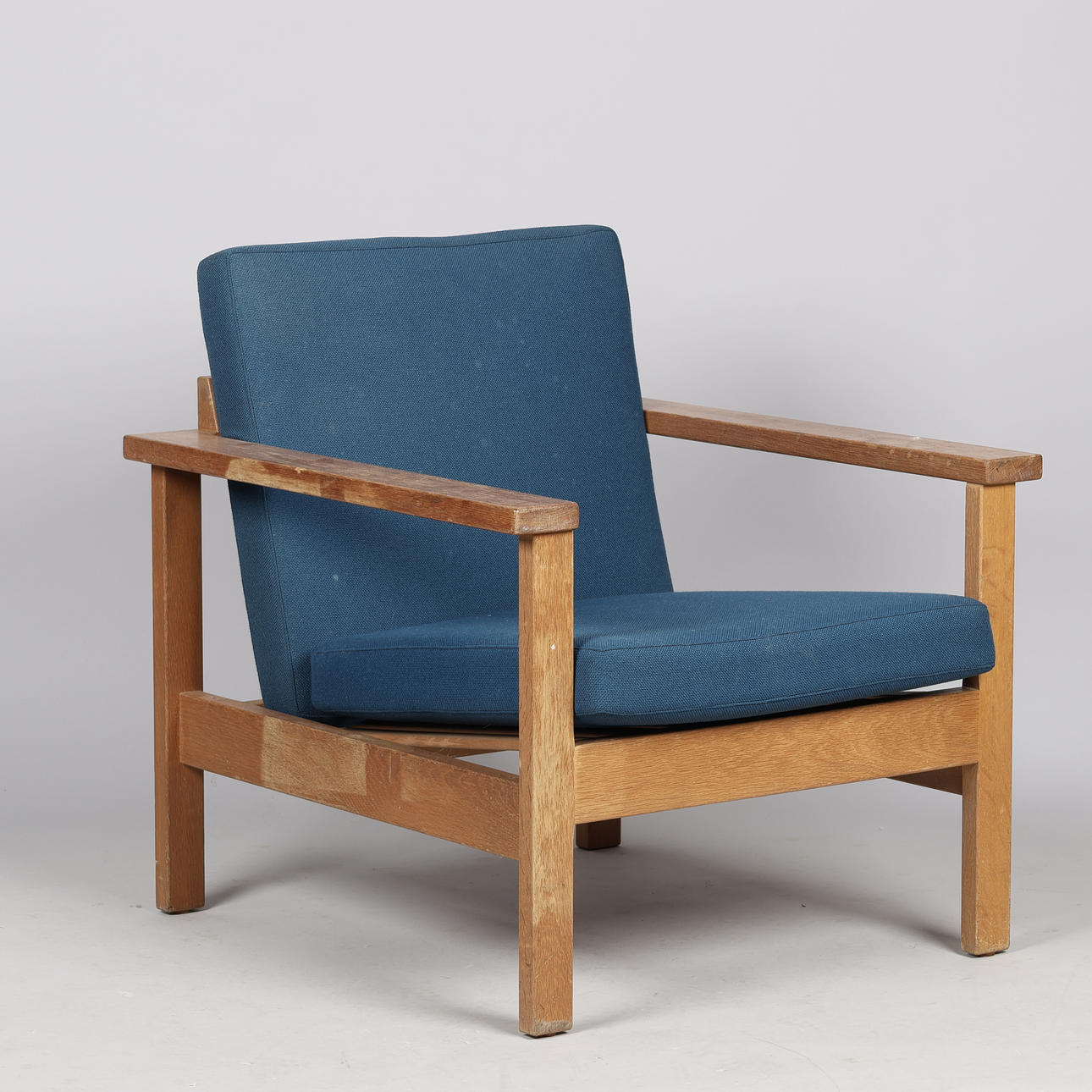 O.D. FURNITURE, an armchair in oak and wool, “Domus Danica”, Denmark, second half of the 20th century.