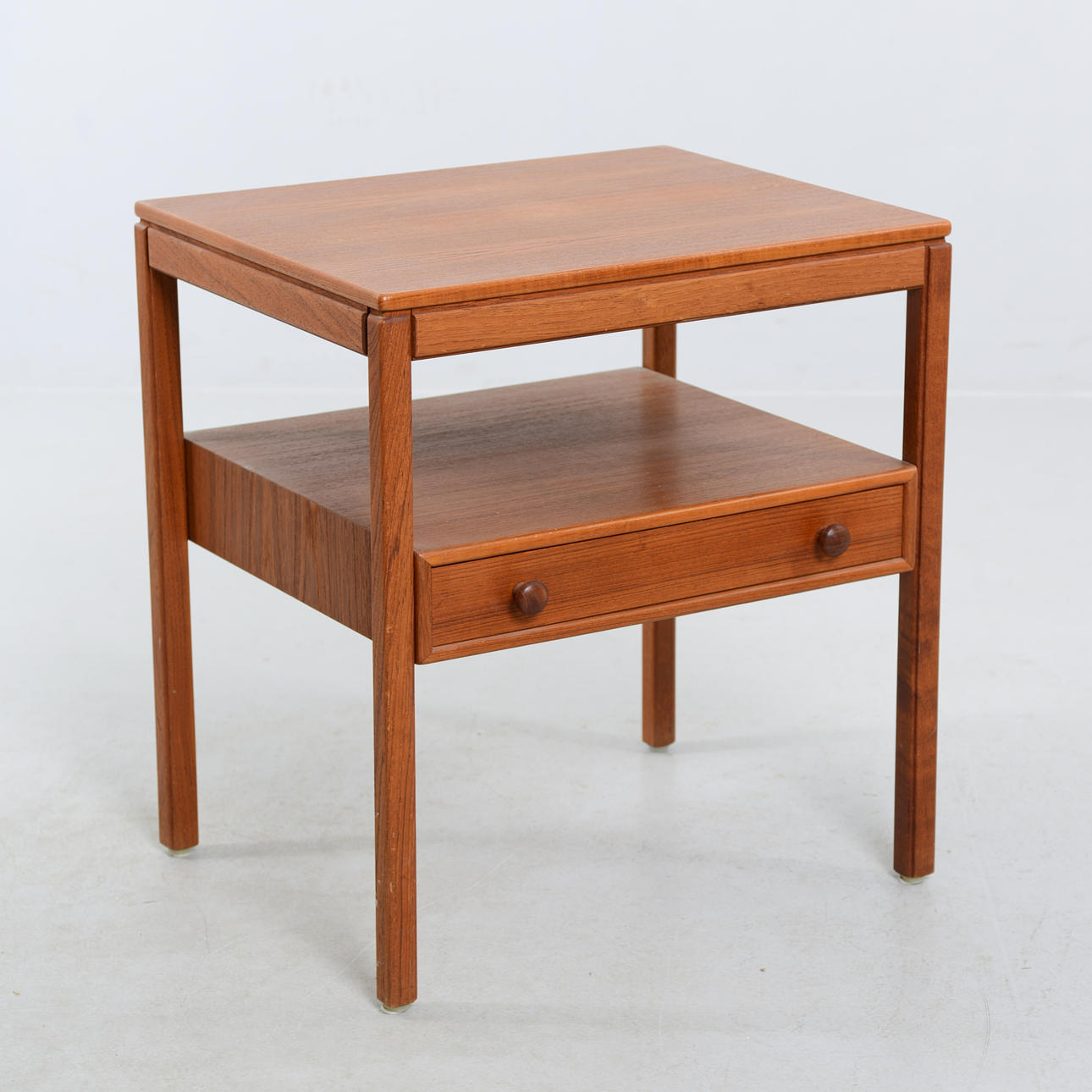 A 1960's teak bedside table.
